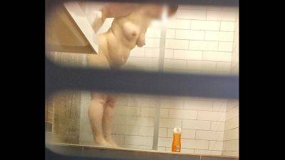 Chubby pussy farting MILF in a hostel shower on tubemilf.net