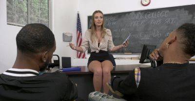 Appealing MILF teacher gets busy with two black studs on tubemilf.net